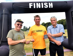 Winner in the Open 50+ age category - Mike Speake with Liam Daly - President of Builth Wells Running Club and Builth Wells Deputy Mayor Councillor Alan Waller. Image by Ted Edwards Photography