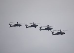 The four Apache Mk1 helicopters are pictured arriving at and later departing from RAF Shawbury on Monday (25).