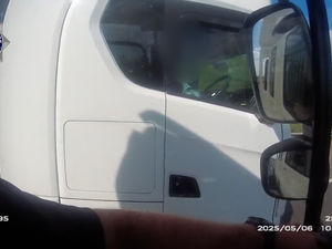 Supporting image for story: HGV Lorry driver caught rolling cigarette on M5 with no hands on wheel