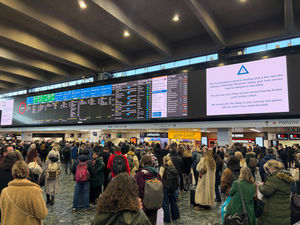 People in Euston Station, London. National Rail Enquiries said some lines of the West Coast Main Line are blocked between London Euston and Watford Junction because of a fire in Camden, north London. Photo: Sam McEvans/PA Wire