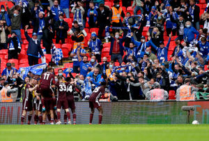 Leicester City's Youri Tielemans celebrates with his team-mates in front of the fans
