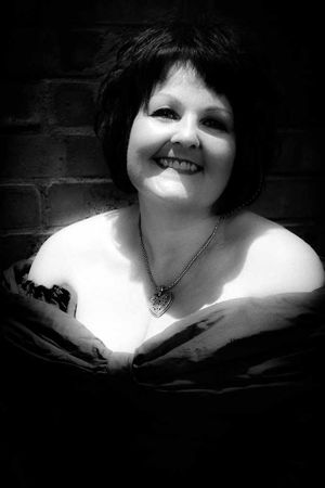 Dame Jayne – in one of her big frocks