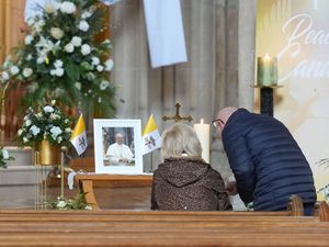 A picture of Pope Francis on display at St Patrick’s Cathedral in Armagh