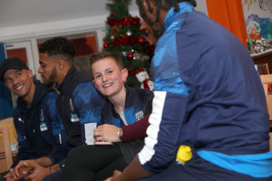 James Dobbins chats with the Albion players. Photo: AMA