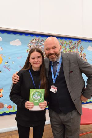 Olga Suta with the headmaster at Springvale Prmiary School, Chris Blunt