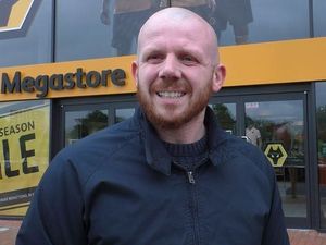 Supporting image for story: 'I think we can get something there!' Wolves fans optimistic ahead of Liverpool clash - VIDEO