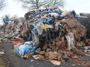 Supporting image for story: Man and business charged after mountain of rubbish dumped on Staffordshire road - and cost almost £10,000 to remove