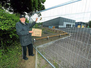 Supporting image for story: Railing blocks ancient Cannock road way