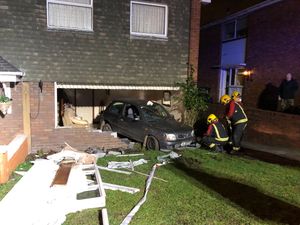 Supporting image for story: Mass brawl in Dudley street leaves elderly woman injured after car smashes into house