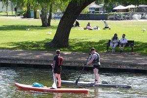 People on paddle boards in Stratford-upon-Avon.