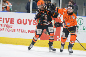 Zayne McKenzie and Jaon Heweitt tangle on the boards. Picture: Steve Brodie