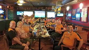 A meet up of Houston Wolves members during a game