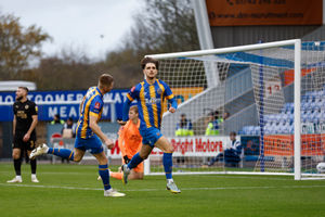 Tom Bayliss of Shrewsbury Town celebrates after scoring a goal to make it 1-0 (AMA)