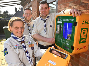 Supporting image for story: Market Drayton Scout leaders celebrate new defibrillator thanks to community 