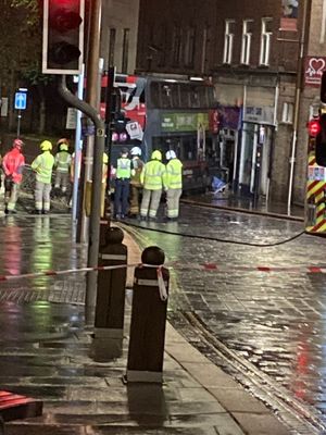 Emergency services at the scene at around 6.30am. Photo: Darren Ward