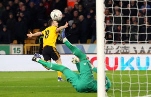 Diogo Jota scores his side's second goal of the game during the FA Cup quarter final match