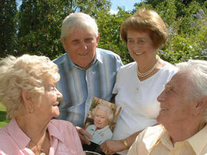 Supporting image for story: Delight for sisters who shared wedding dress