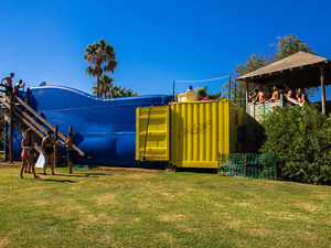 Supporting image for story: S Jones surfs the wave with ride