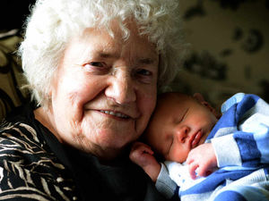 Supporting image for story: Baby boy makes it five generations for 60 member family