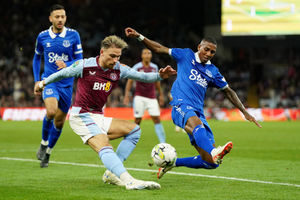 
              
Aston Villa's Matty Cash (left) and Everton's Ashley Young 