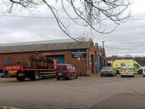 Supporting image for story: 20ft roof fall  in suspected factory raid