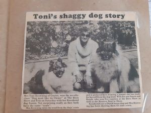 Toni in an old newspaper article wearing the jumper she made from her dogs' hair