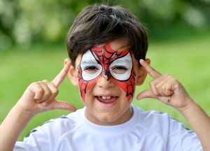 Aris Dumitru enjoys the face painting