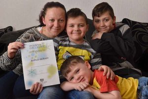 Josh with his mum Louise, and brothers Thomas Connor