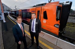 West Midlands Mayor Andy Street with West Midlands Trains' managing director Ian McConnell and the new train – named after Charles Darwin.