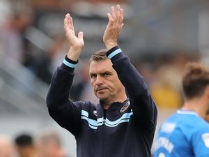 Supporting image for story: Boss John Askey hails Shrewsbury fans for creating fortress Montgomery Waters Meadow