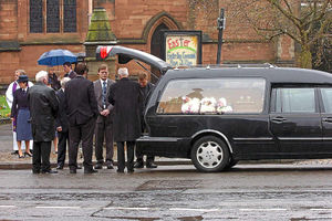 Mourners outside St Nicholas Church, Newport, in April 2006. About 300 people lined the streets.