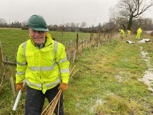 Saturday hedge planting. Volunteers did their best despite stormy weather.