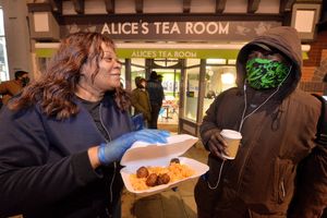 Maria McKellar with a customer..