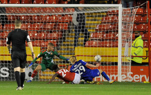 Luke Armstrong scores the third for Harrogate