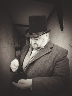 Richard Beckett as Ebenezer Scrooge.