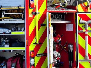 Supporting image for story: Fire crews use cutting equipment to free person from crash