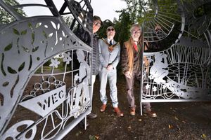 Volunteer and custodian Terry Holdcroft with Wolverhampton Mayor Craig Collingswood and Tim Tolkien who originally sculpted the gates and has now seen them restored,

