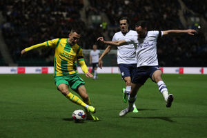 Jed Wallace of West Bromwich Albion and Greg Cunningham of Preston North End during the Sky Bet Championship between Preston North End and West Bromwich Albion at Deepdale on October 5, 2022 in Preston, United Kingdom. (Photo by Adam Fradgley/West Bromwich Albion FC via Getty Images).