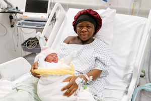 Amina Suleman with her new baby daughter Zara, who was born on New Year's Day.