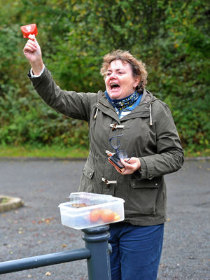 Jennifer Harrower rings her cow bell as runners make their way around Shropshire