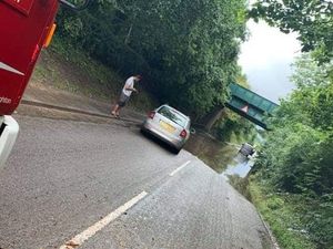 Supporting image for story: Road closed as car stranded in Albrighton flood water