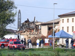 Supporting image for story: Three Italian police officers killed in blast while evicting siblings from house