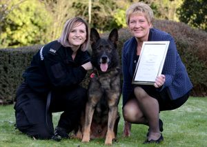 Canto with handler PC Emma Worall and Jan McLoughlin the charity's Director General