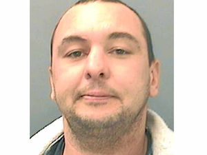 Supporting image for story: 'Invisible' bomb threat bandit is sent to jail