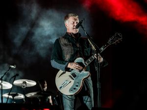 Supporting image for story: Queens Of The Stone Age headline festival rocked by controversy