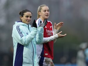 Renee Slegers, left, and Alessia Russo applaud fans after a match