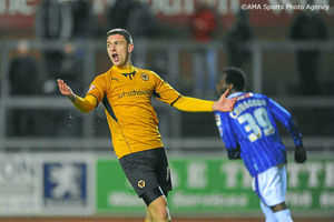 Jake Cassidy of Wolverhampton Wanderers holds out his arms after a missed chance.