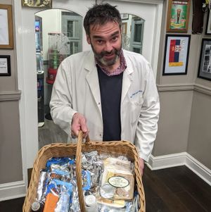 Express and Star reporter Adam Smith selling cockles with Rod