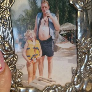 Ian Massey pictured on a family holiday with Charlie Massey, one of his four daughters