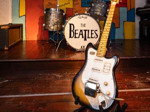 Supporting image for story: Guitar bought by teenage George Harrison for £58 sells for more than £1 million